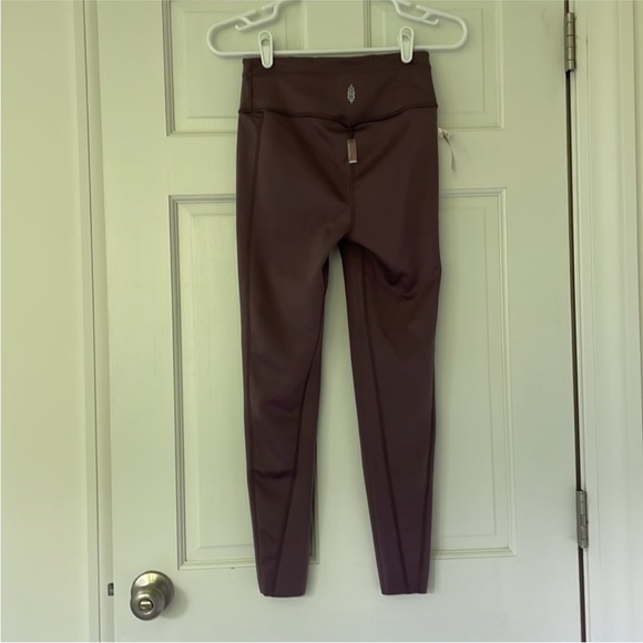 NWT FREE PEOPLE MOVEMENT leggings size L purple reversible tiger combo - Picture 6 of 7